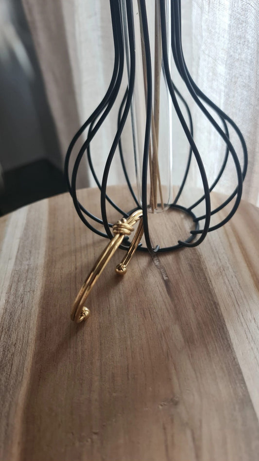 Bracciale rigido nodo